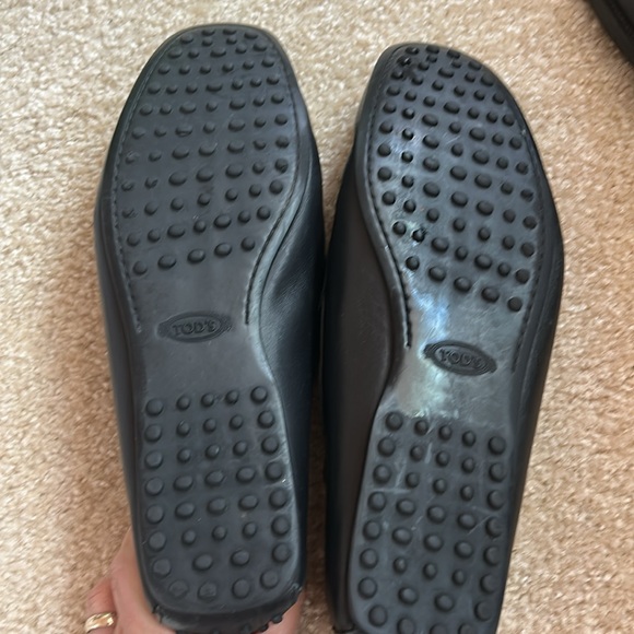 Tod\'s Black Leather Slip-On Loafers with Metal Buckle